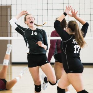 Girls playing volleyball